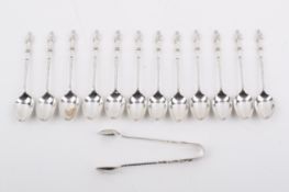 A set of twelve Walker & Hall Stirling silver hallmarked 'Apostle' teaspoons and a pair of matching