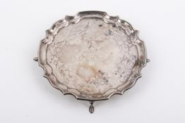 A small Elizabeth II Stirling silver hallmarked pie crust edge salver.