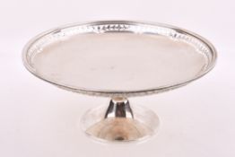 A Stirling silver hallmarked tazza. Having a pierced floral rim, by E. S. Barnsley & Co.