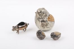 Four silver mounted and weighted pin cushions.