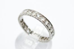 A platinum and diamond full eternity ring. Set with round brilliant cut diamonds of circa 1.