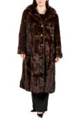 A vintage chestnut brown ermine fur coat.