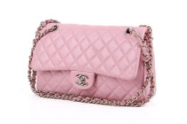 A pink 'Chanel' type quilted double flap handbag.