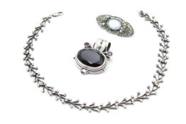 A collection of items, variosly marked/assessed as silver with imitation gemstones.