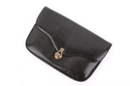 A vintage Gucci black lizard skin shoulder bag.