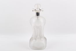 A large Victorian silver collared glass decanter with ribbed body and pinched waist,