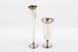 Two Stirling silver hallmarked weighted tulip vases. Both raised on circular bases. Largest H204mm.
