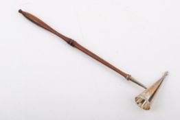 A Stirling silver hallmarked candle snuffer with turned mahogany handle. London, 1986.