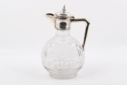 A Victorian Stirling silver hallmarked mounted claret jug.