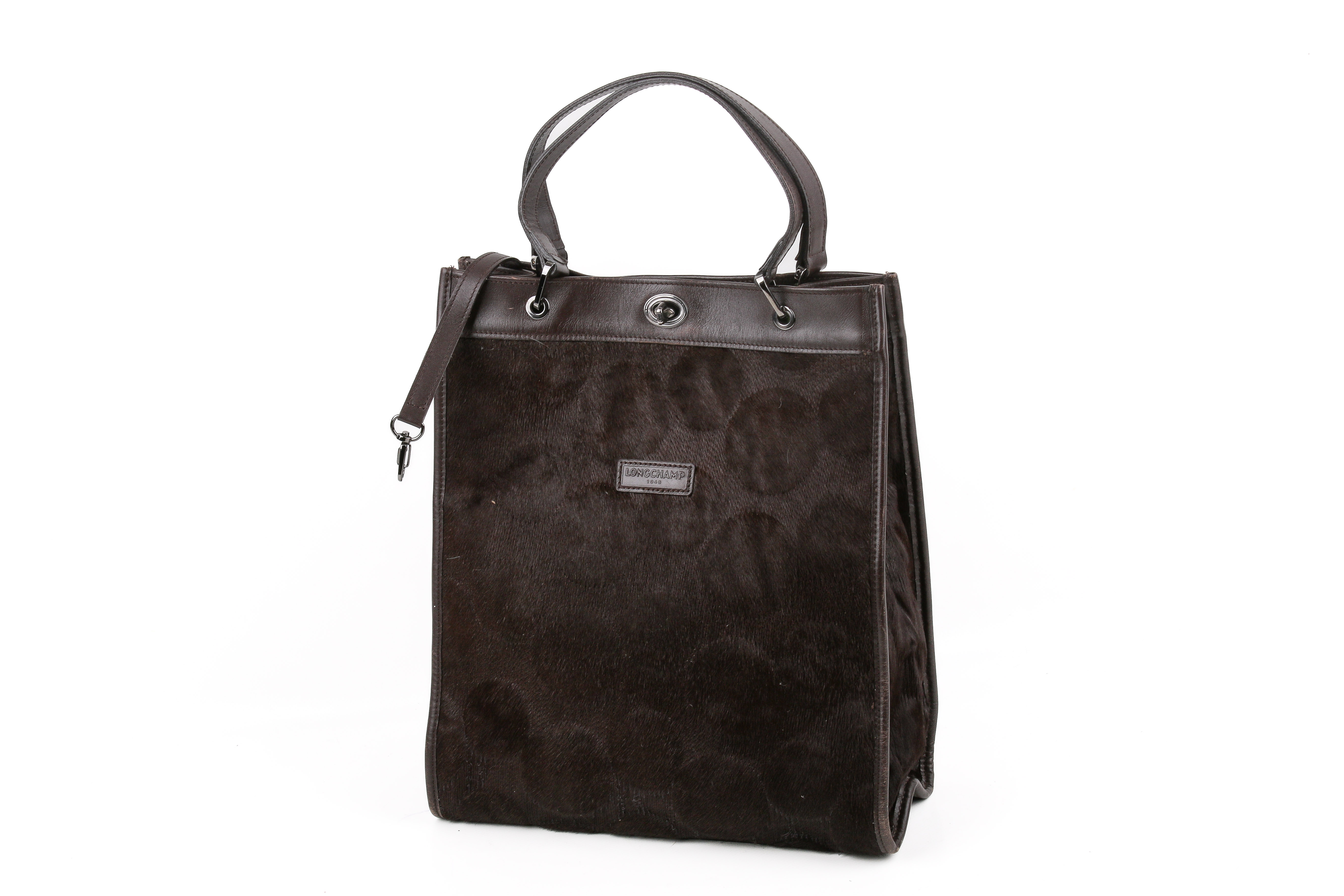 A Longchamp brown pony effect tote handbag.