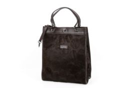 A Longchamp brown pony effect tote handbag.