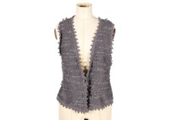 A silvery-grey Annie Fawlass knitted waistcoat.