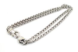 A silver, 18ct gold and diamond David Yurman double striing necklace.