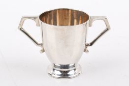 A small Irish twin-handled silver cup.