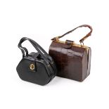 Two vintage leather handbags.