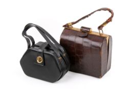 Two vintage leather handbags.