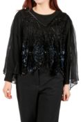 A black and blue beaded sheer evening top.