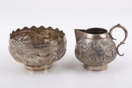 Two Indian white metal items.