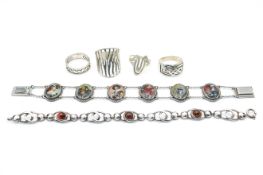 A collection of items, variously marked/assessed as silver.