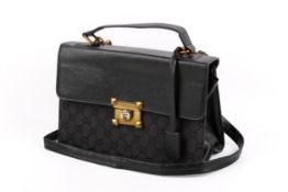 A vintage Gucci handbag.