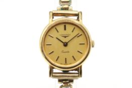 A Longines quartz yellow metal cocktail watch.