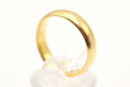 A 22ct gold wedding band. Hallmarked, width 4mm, size N, weight 5.7g.