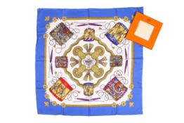 A Hermes 'Les Tambours' silk scarf.