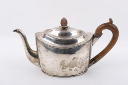 A Georgian Stirling silver tea pot with a pineapple finial. 1799, London, Peter & Ann Bateman.
