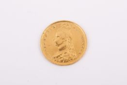 An 1887 half sovereign coin. Weight 4g.