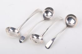 A group of four Stirling silver hallmarked small ladles. Including a 1791, Edinburgh, WR, etc.