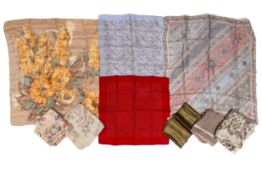 A collection of vintage silk and fabric scarves.