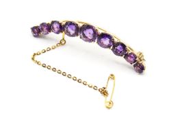 A 9ct gold and amethyst brooch.