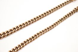 A 9ct gold graduated curb link watch Albert chain.