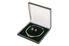 A Christian Dior necklace and earrings set.