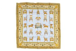 A Gucci silk 'Chairs' scarf.