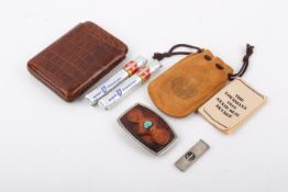 A group of three gentleman's accessories.