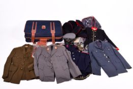 A suitcase containing British and German military uniforms,