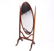 An early 20th Century oval mahogany cheval mirror.