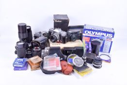 A large collection of assorted cameras and lenses. Some boxed.