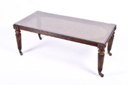 A 20th century French Louis XVI style cane top coffee table.