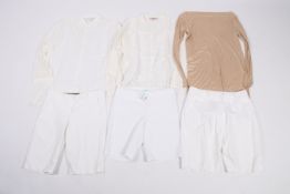 A collection of ladies designer and high end clothing.