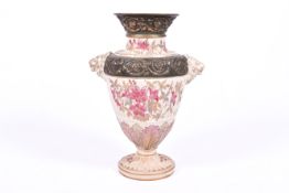A 20th Century porcelain vase, decorative gilded floral motifs with two lion heads.