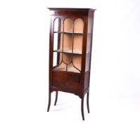 An Edwardian mahogany glazed display cabinet. Height 167cm.