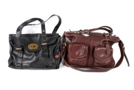 A Texier handbag and a Pia handbag.