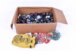 A collection of assorted glass marbles, mostly 20th century. Various sizes and colours.