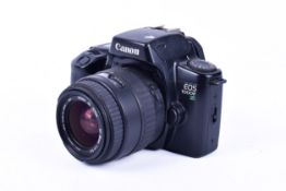 A Canon EOS 1000F N 35mm SLR camera. With a Sigma DL Zoom 35-80mm f4-5.6 lens, optics G.