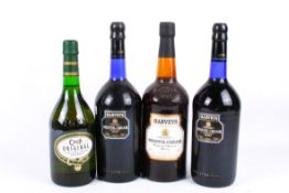 Four bottles of assorted sherry.