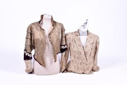 A Victorian ladies embroidered fitted jacket and one other jacket, on hanger mannequins.
