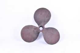 A vintage bronze boat propellor with three fins. Stamped J. Stone & Co. Ltd.