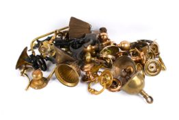 A collection of assorted brass door fittings and door furniture.